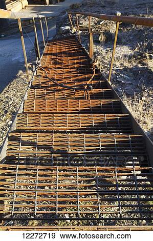 Stock Photo - Rusting steel steps at Dollarton Ship Yard, North Vancouver, British Columbia, Canada. Fotosearch