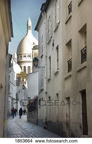 Sacre-Coeur Basilica At End Of Narrow Street; Montmartre, Paris, France View Large Photo Image Picture - Sacre-Coeur Basilica At End Of Narrow Street; Montmartre, Paris, France. Fotosearch