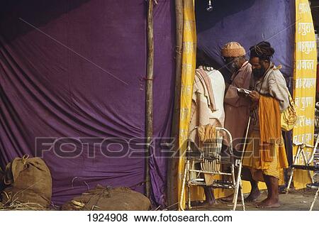 Stock Photo - Sadhus Shopping During Kumbh Mela.. Fotosearch