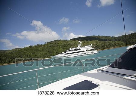 Stock Photo - Sail Boat And Yacht Off Whitsunday Islands. Fotosearch