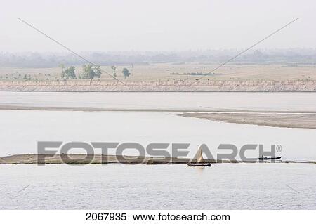 Stock Photography - Sail Boat On The Ganges River, Patna, Bihar, India. Fotosearch