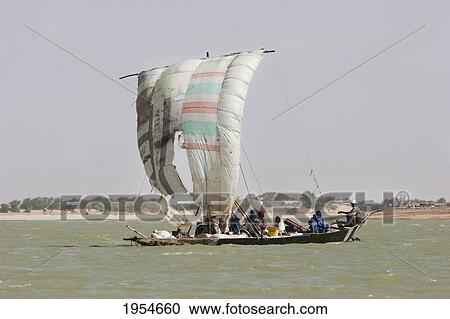Sail boat on the Niger River between Niafunke and Kabara, Mali View Large Photo Image Stock Image - Sail boat on the Niger River between Niafunke and Kabara, Mali. Fotosearch