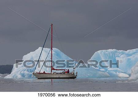 Stock Photograph - Sailboat In Laguna San Rafael, Laguna San Rafael National Park, Aysen Region, Chile. Fotosearch