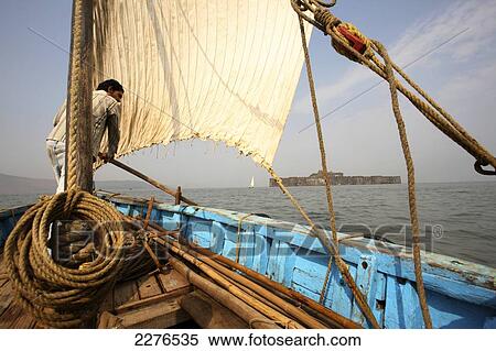 Stock Photography - Sailboat on the Arabian sea coast; Murud, Maharashtra, India. Fotosearch
