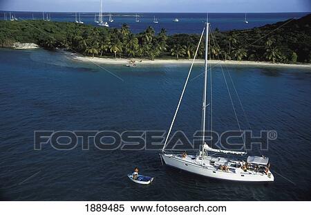 Sailboat Passing By Island, Aerial View View Large Photo Image Stock Photography - Sailboat Passing By Island, Aerial View. Fotosearch