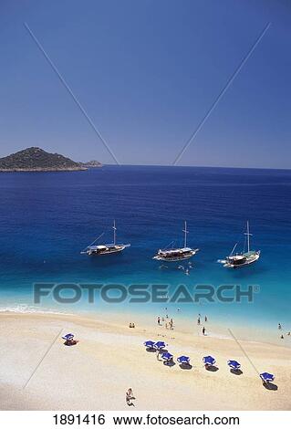 Stock Photograph - Sailboats Anchored Near Beach, Aerial View. Fotosearch