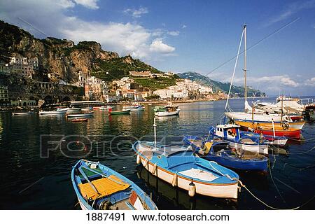 Sailboats And City On Rocky Shoreline View Large Photo Image Stock Image - Sailboats And City On Rocky Shoreline. Fotosearch
