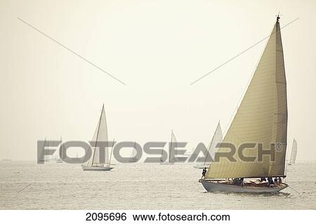 Sailboats At Dusk; Cap Antibes Provence France View Large Photo Image Stock Photograph - Sailboats At Dusk; Cap Antibes Provence France. Fotosearch