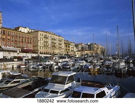 Stock Image - Sailboats In Marina On Town's Waterfront. Fotosearch