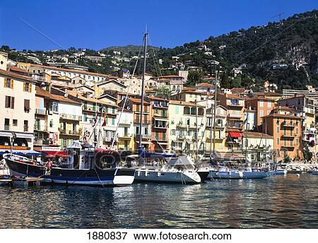 Stock Photo - Sailboats In Marina On Town's Waterfront. Fotosearch