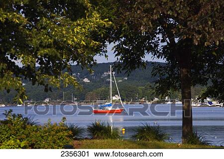 Stock Image - Sailboats On Lac Memphremagog In Early Morning; Magog, Quebec, Canada. Fotosearch