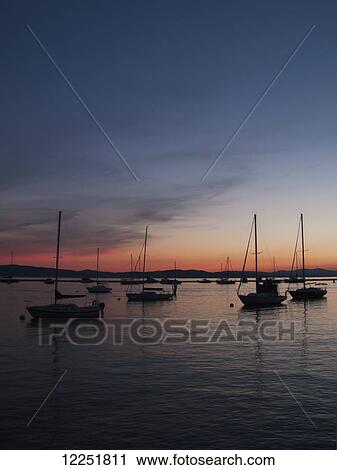 Sailboats on Lake Champlain at sunset; Burlington, Vermont, United States of America View Large Photo Image Stock Image - Sailboats on Lake Champlain at sunset; Burlington, Vermont, United States of America. Fotosearch