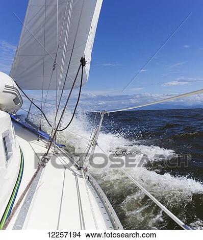 Sailing along the coast; British Columbia, Canada View Large Photo Image Picture - Sailing along the coast; British Columbia, Canada. Fotosearch