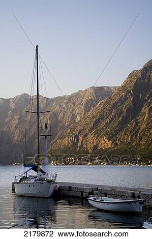 Sailing And Rowing Boats Moored At Sunset, Kotor Bay Monte. Tif View Large Photo Image Stock Image - Sailing And Rowing Boats Moored At Sunset, Kotor Bay Monte. Tif. Fotosearch