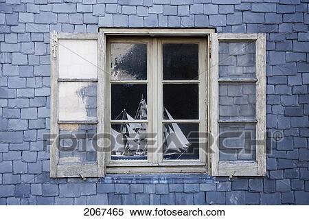 Stock Photography - Sailing Ship Model In A Window, Mont Saint-Michel, France. Fotosearch