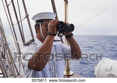 Sailor On Board Of The Four-Mast Barquentine, Chilean Navy Training Ship Esmeralda In Hanga Roa Harbour, Rapa Nui (Easter Island), Chile View Large Photo Image Stock Image - Sailor On Board Of The Four-Mast Barquentine, Chilean Navy Training Ship Esmeralda In Hanga Roa Harbour, Rapa Nui (Easter Island), Chile. Fotosearch