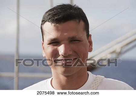 Stock Photo - Sailor On Board Of The Four-Mast Barquentine, Chilean Navy Training Ship Esmeralda In Hanga Roa Harbour, Rapa Nui (Easter Island), Chile. Fotosearch