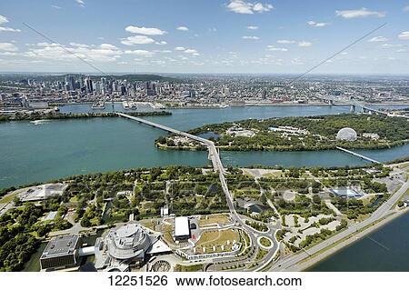 Stock Photograph - Saint Lawrence River against urban landscape; Montreal, Quebec, Canada. Fotosearch