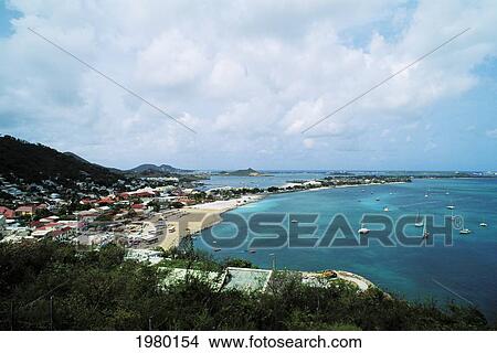 Saint Martin, view of coastal town and harbor; Caribbean, Overlooking Marigot from fort View Large Photo Image Picture - Saint Martin, view of coastal town and harbor; Caribbean, Overlooking Marigot from fort. Fotosearch