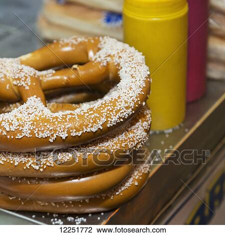 Salted pretzels and condiments on a food cart; New York City, New York, United States of America View Large Photo Image Stock Image - Salted pretzels and condiments on a food cart; New York City, New York, United States of America. Fotosearch