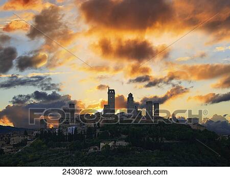 San Gimignano at sunset; San Gimignano, Tuscany, Italy View Large Photo Image Stock Image - San Gimignano at sunset; San Gimignano, Tuscany, Italy. Fotosearch
