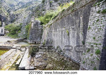 Stock Image - San Giovanni Fortress Surrounds The Town Of Kotor. The Walls Surrounding The Town Are 5 Kilometers Long And Can Be Up To Twenty Meters Tall., Monte. Fotosearch