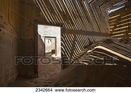 Picture - Sand In Abandoned House; Kolmanskop Ghost Town, Namibia. Fotosearch