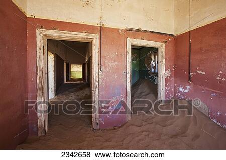 Stock Photo - Sand In Red Room; Kolmanskop Ghost Town, Namibia. Fotosearch