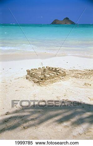 Sandcastle In White Sand Along Shoreline, Palm Shadow, Island Background C1752 View Large Photo Image Stock Photography - Sandcastle In White Sand Along Shoreline, Palm Shadow, Island Background C1752. Fotosearch