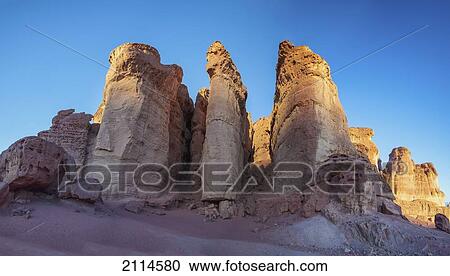 Sandstone Formations Called Solomon's Pillars At Mount Timna Against A Blue Sky; Timna Park Arabah Israel View Large Photo Image Stock Image - Sandstone Formations Called Solomon's Pillars At Mount Timna Against A Blue Sky; Timna Park Arabah Israel. Fotosearch