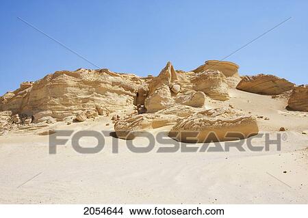 Sandstone Formations Resulting From Wind Erosion In Wadi Al-Hitan (Whale Valley), El Fayoum, Egypt View Large Photo Image Picture - Sandstone Formations Resulting From Wind Erosion In Wadi Al-Hitan (Whale Valley), El Fayoum, Egypt. Fotosearch
