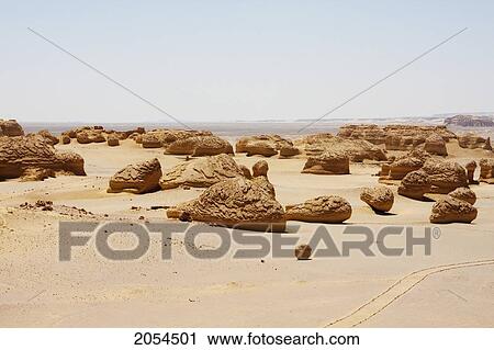 Stock Image - Sandstone Formations Resulting From Wind Erosion In Wadi Al-Hitan (Whale Valley), El Fayoum, Egypt. Fotosearch