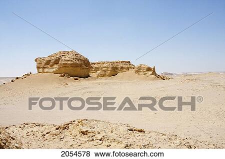 Sandstone Formations Resulting From Wind Erosion In Wadi Al-Hitan (Whale Valley), El Fayoum, Egypt View Large Photo Image Stock Photo - Sandstone Formations Resulting From Wind Erosion In Wadi Al-Hitan (Whale Valley), El Fayoum, Egypt. Fotosearch