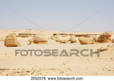Stock Photograph - Sandstone Formations Resulting From Wind Erosion In Wadi Al-Hitan (Whale Valley), El Fayoum, Egypt. Fotosearch