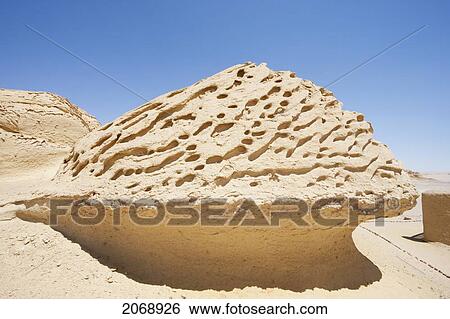 Stock Photograph - Sandstone Formations Resulting From Wind Erosion In Wadi Al-Hitan (Whale Valley), El Fayoum, Egypt. Fotosearch