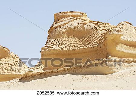 Sandstone Formations Resulting From Wind Erosion In Wadi Al-Hitan (Whale Valley), El Fayoum, Egypt View Large Photo Image Stock Photography - Sandstone Formations Resulting From Wind Erosion In Wadi Al-Hitan (Whale Valley), El Fayoum, Egypt. Fotosearch