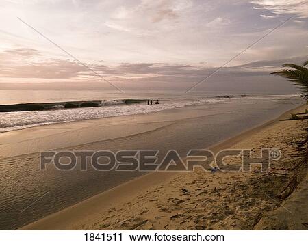 Stock Image - Sandy Beach At Sunset; Arabian Sea, Kerala, India. Fotosearch