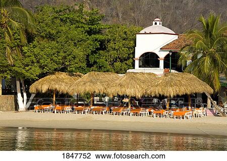Santa Cruz Beach, Huatulco, Oaxaca State, Mexico; Waterfront Cafe On Beach View Large Photo Image Stock Image - Santa Cruz Beach, Huatulco, Oaxaca State, Mexico; Waterfront Cafe On Beach. Fotosearch