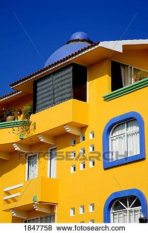 Stock Photo - Santa Cruz, Huatulco, Oaxaca State, Mexico; Low Angle View Of Colorful Hotel. Fotosearch