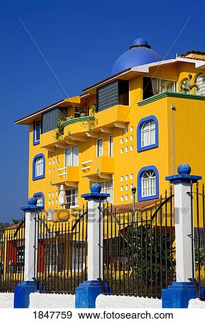 Santa Cruz, Huatulco, Oaxaca State, Mexico; Gate In Front Of Colorful Hotel View Large Photo Image Stock Photo - Santa Cruz, Huatulco, Oaxaca State, Mexico; Gate In Front Of Colorful Hotel. Fotosearch