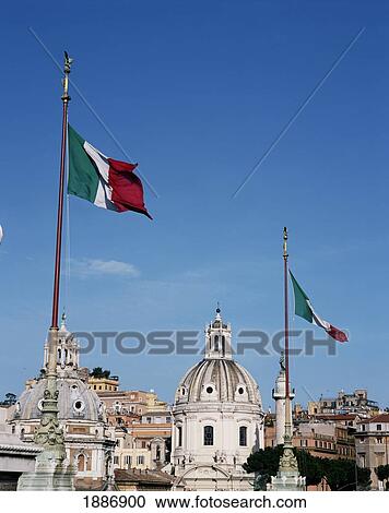 Stock Image - Santa Maria Di Loreto And Dome Di Maria And Italian Flags. Fotosearch