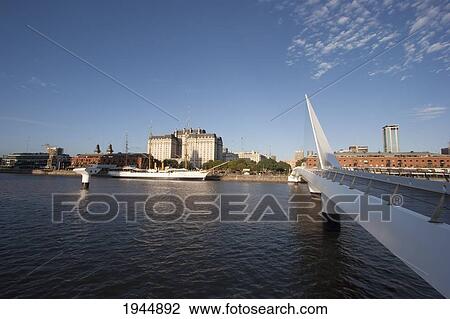 Stock Image - Santiago Calatrava's Puente de La Mujer (Women's Bridge) in Puerto Madero at night, Buenos Aires, Capital Federal, Argentina. Fotosearch