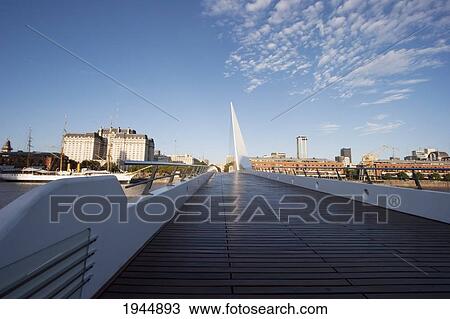 Stock Image - Santiago Calatrava's Puente de La Mujer (Women's Bridge) in Puerto Madero at night, Buenos Aires, Capital Federal, Argentina. Fotosearch