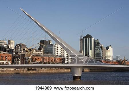 Stock Photo - Santiago Calatrava's Puente de La Mujer (Women's Bridge) in Puerto Madero at night, Buenos Aires, Capital Federal, Argentina. Fotosearch