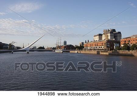 Stock Photo - Santiago Calatrava's Puente de La Mujer (Women's Bridge) in Puerto Madero at night, Buenos Aires, Capital Federal, Argentina. Fotosearch