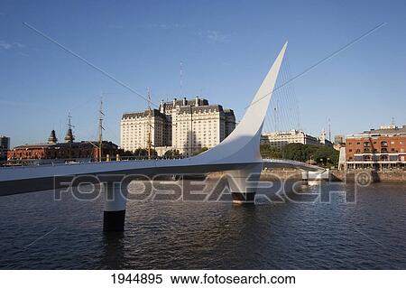 Stock Photography - Santiago Calatrava's Puente de La Mujer (Women's Bridge) in Puerto Madero at night, Buenos Aires, Capital Federal, Argentina. Fotosearch