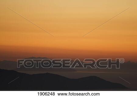 Stock Photo - Santo Stefano Coastline At Sunset, Tuscany, Italy. Fotosearch