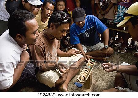 Stock Photo - Scenes At A Cricket Fight. Fotosearch