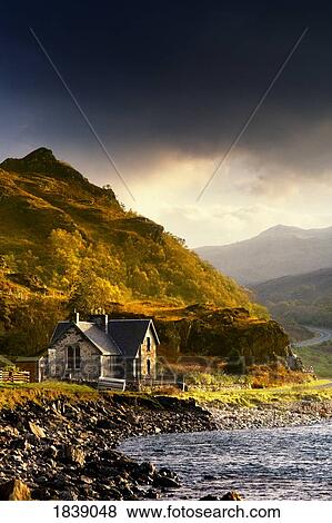 Stock Photo - Scenic Mountain View With Country House; Ardnamurchan Peninsula, Scotland, Uk. Fotosearch