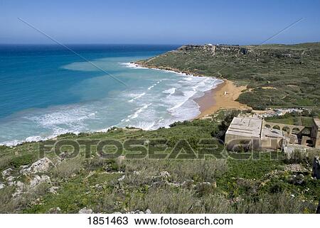Stock Image - Scenic Shot Of A Beach Near A Building. Fotosearch
